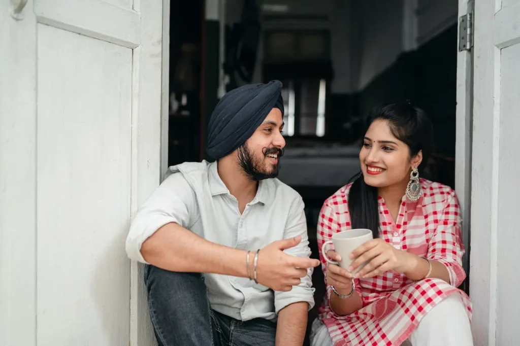 couple talking at door